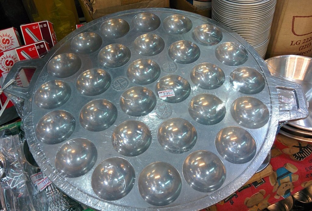 圆形金属卡农克锅具的多排凹槽